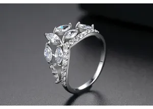 Close-up of silver-plated crown ring with marquise-cut cubic zirconia stones
