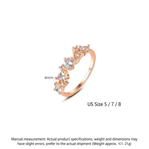 Anillo elegante de latón oro rosa con piedras de circonita blanca brillante engastadas