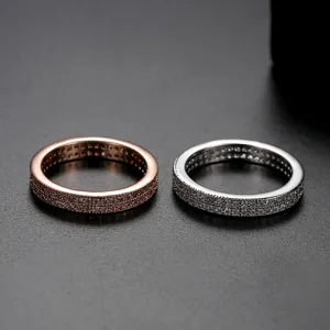 Elegante dubbelrijige zirkonia eeuwigheidsringen in roségoud en zilveren finish