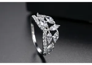 Detailed macro view of an elegant ring featuring marquise-cut zirconia leaves.