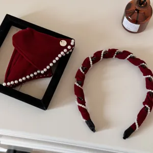 Elegant vintage red velvet headband set with white pearl decorations for winter