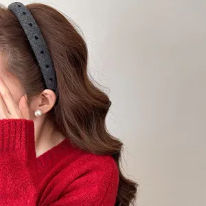 Wide gray fabric headband with heart pattern for an elegant high top knot hair look.