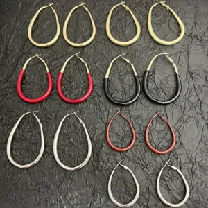 Variety of retro oval drip oil hoop earrings in multiple colors and sizes