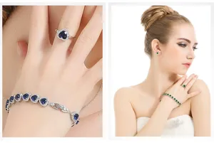 Elegante sieradenset met hartvormige blauwe en groene zirkonia stenen, ring en armband