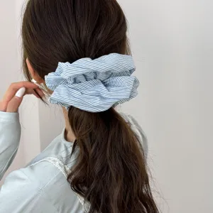Stylish oversized blue striped scrunchie hair tie for elegant Korean-inspired hair styling
