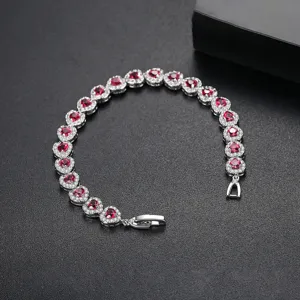 Elegante pulsera de plata con piedras rojas en forma de corazón y circonitas para mujer.
