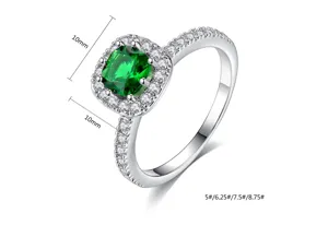 Anillo con circonita verde talla esmeralda, engaste halo de 10 mm y opciones de talla