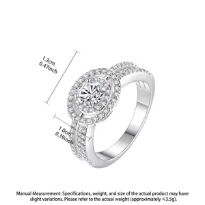 Elegante anillo plateado con halo redondo y circonitas brillantes para bodas y fiestas