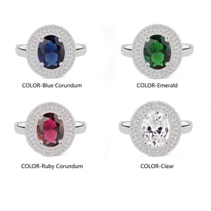 Juego de cuatro elegantes anillos con circonitas ovaladas de colores en halo