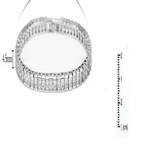 Detailed view of silver-toned 4.5mm single row cubic zirconia tennis bracelet on a white scale
