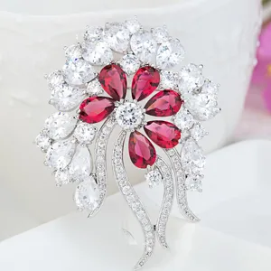 Elegant French vintage floral brooch with red and clear 3A cubic zirconia stones