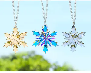 Set of three crystal snowflake car ornaments in gold, blue, and iridescent finishes