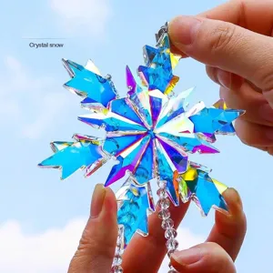 Iridescent crystal snowflake car hanging ornament reflecting vibrant rainbow colors