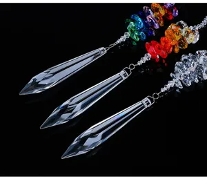 Detailed view of faceted K9 crystal pendants with rainbow beads for home decor