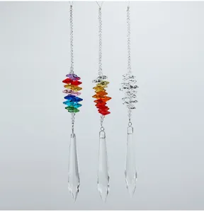 Detailed view of K9 crystal suncatchers in various colors including rainbow and clear prisms