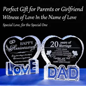Custom heart-shaped crystal anniversary ornaments with engraved 'LOVE' and 'DAD' bases