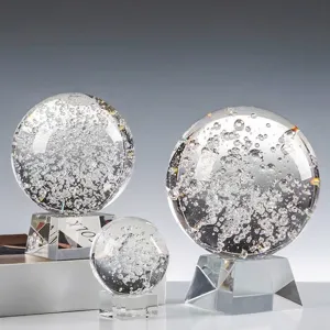 Elegant K9 crystal bubble spheres on faceted bases for modern home and office desk decor