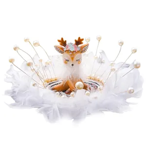 Adorable car dashboard deer figurine in a luxurious white feather and pearl nest