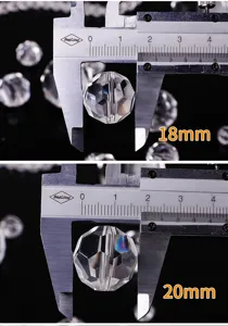 Close-up view of faceted crystal lamp beads showing 18mm and 20mm sizes with calipers.