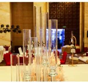 Detail view of tall multi-head crystal glass candle holder for wedding banquet decor