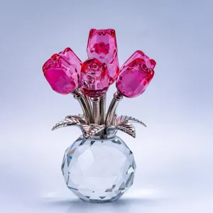 Exquisite crystal rose flower ornament with faceted vase and silver stems for home desktop decor.