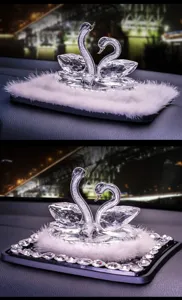 Crystal swan car ornament with furry base and sparkling rhinestones, elegant auto decor.