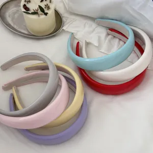 Detail showing colorful padded leather headbands with soft sponge for hair volume