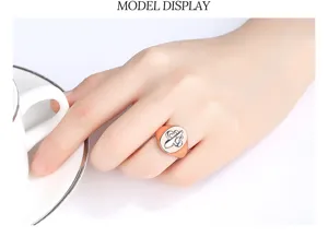 Retro men's Fleur-de-lis signet ring with two-tone plating shown on hand