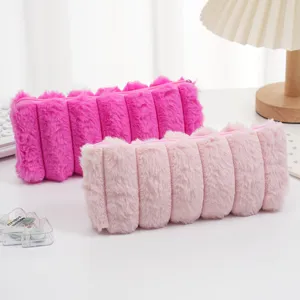 Estuches de lápices de piel de conejo sintética de felpa suave a rayas en fucsia y rosa