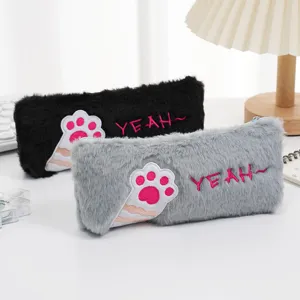 Detail of cute plush cat paw pencil cases featuring high-quality embroidery textures