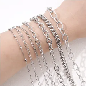 Detailed close-up showing various textured stainless steel chains for DIY jewelry making