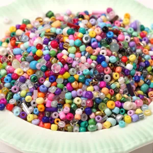 Macro detail of mixed colorful 2-4mm glass seed beads for handmade DIY jewelry crafting