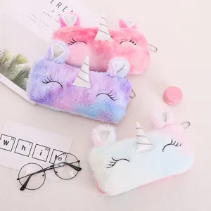 Set di tre astucci per matite unicorno in peluche nei colori pastello rosa e viola