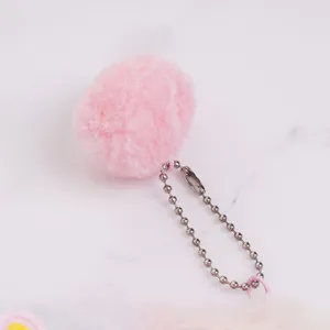 Lindo colgante de pompón de felpa rosa con cadena de bolas plateada para estuches