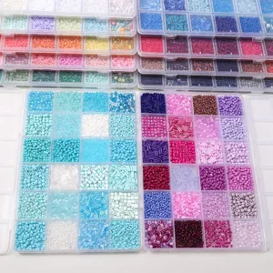 24-grid organizer boxes filled with colorful assorted seed and bugle glass beads set