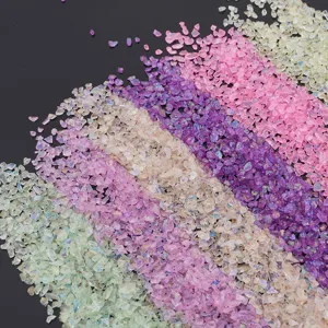 Close-up macro detail of multi-colored AB coated glass crushed stone chips for DIY jewelry crafts