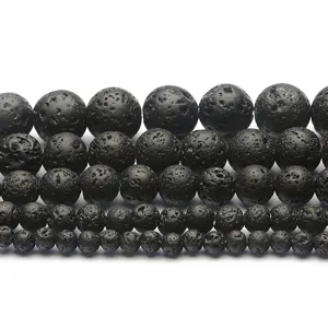 Macro view showing the porous texture of black lava stone beads for DIY jewelry making