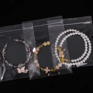 Detailed view of jewelry stored in high-transparency zip lock plastic bags for protection