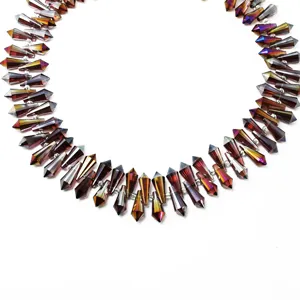 Detailed view of 6x15mm iridescent glass pointed drop beads for handmade DIY jewelry making
