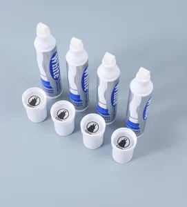 Professional close-up of four white markers with 10mm brush tips and matching caps