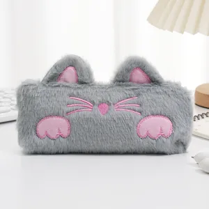 Detail view of a cute grey plush cat pencil case with pink embroidered features