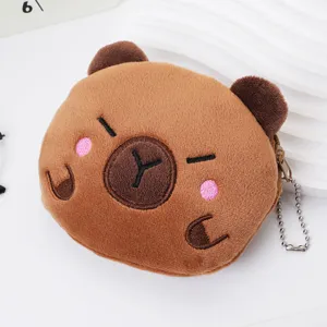 Close-up of a cute plush capybara coin purse showing its soft texture and embroidery