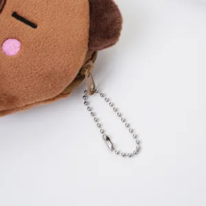 Close-up of Capybara plush coin purse zipper and silver ball chain hanging detail.