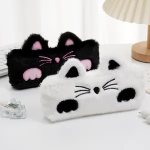 Cute cartoon cat pencil cases made of fluffy faux rabbit fur in black and white colors
