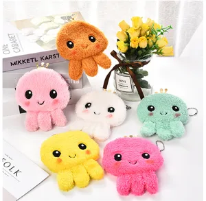 Collection of adorable colorful plush octopus coin pouches with gold crown details