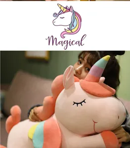 Close-up of a large pink unicorn plush toy being hugged, showcasing soft, premium texture.