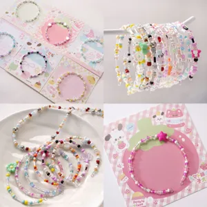 Detailed view of colorful handmade glass seed bead bracelets with floral and star charms