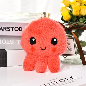 Cute plush orange octopus coin purse with gold crown decoration for keys and cables