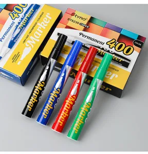 Detailed view of four colorful permanent markers with their retail packaging boxes