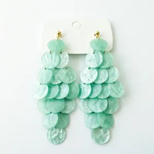 Mint green disc dangle earrings with long tassel design for a bohemian summer look